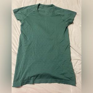 Forest green lululemon swiftly tech shirt size 12 barely worn